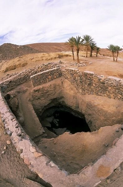 Egypt - An ancient water well in Arabian desert approx. 50 km from Hurghada town (Red sea shore), in the evening; Egypt. January Eg39. 0033