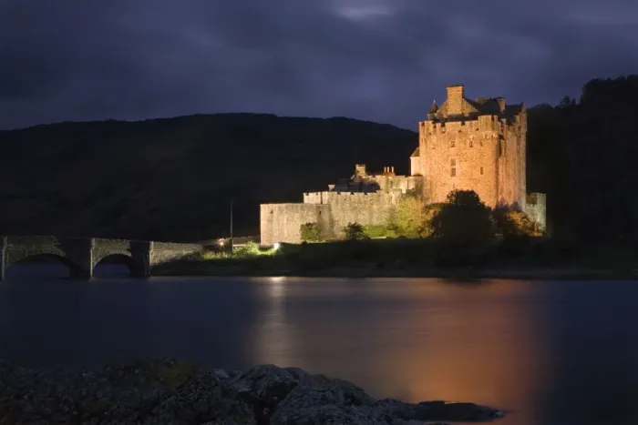 Framed Print : Eilean Donan Castle - being lit up at dusk - November - Scotland Framed Print : Eilean Donan Castle - being lit up at dusk - November - Scotland