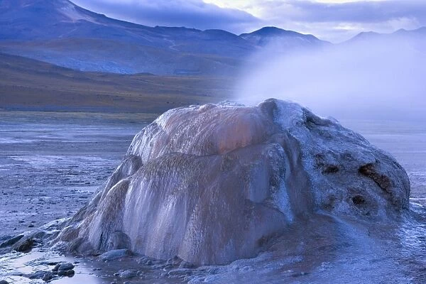 El Tatio Geysers - geothermal field of hot springs and geysers which is located at over 4200 m above sea level - at dawn - Altiplano Atacama Desert - Chile - South America