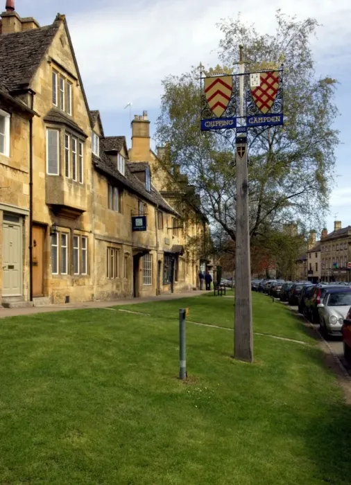Framed Print : England - Chipping Campden High Street, always very busy with visitors and tourists. April. UK Framed Print : England - Chipping Campden High Street, always very busy with visitors and tourists. April. UK