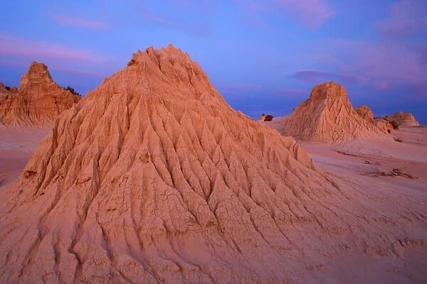 Eroded pinnacles - amazingly shaped, eroded pinnacles of the lunette Walls of China, located within the since 18000 years dried-up lakebed of Lake Mungo, at dusk