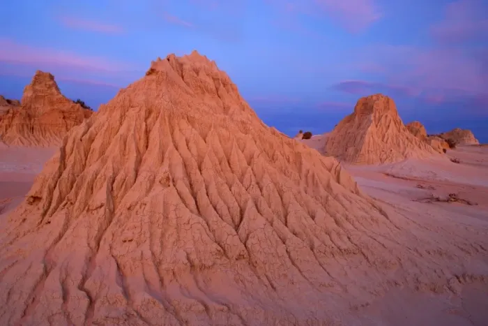 Framed Print : Eroded pinnacles - amazingly shaped, eroded pinnacles of the lunette Walls of China, located within the since 18000 years dried-up lakebed of Lake Mungo, at dusk Framed Print : Eroded pinnacles - amazingly shaped, eroded pinnacles of the lunette Walls of China, located within the since 18000 years dried-up lakebed of Lake Mungo, at dusk