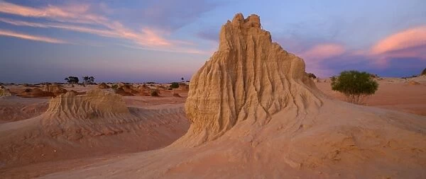 Eroded pinnacles - amazingly shaped, eroded pinnacles of the lunette Walls of China, located within the since 18000 years dried-up lakebed of Lake Mungo, at dusk
