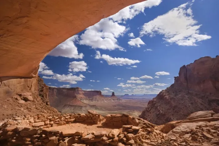 Framed Print : False Kiva - ancient indian ruin tucked into an alcove of rock with a breathtaking panoramic view over canyons and sandtone buttes - Island in the Sky, Canyonlands National Park, Utah, USA Framed Print : False Kiva - ancient indian ruin tucked into an alcove of rock with a breathtaking panoramic view over canyons and sandtone buttes - Island in the Sky, Canyonlands National Park, Utah, USA
