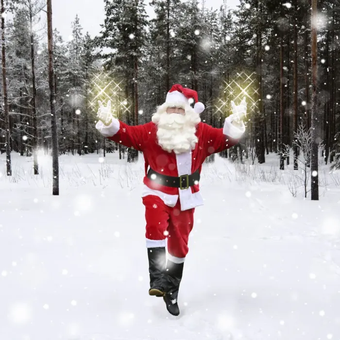 Framed Print : Father Christmas / Santa Claus waking through snow landscape with trees Framed Print : Father Christmas / Santa Claus waking through snow landscape with trees
