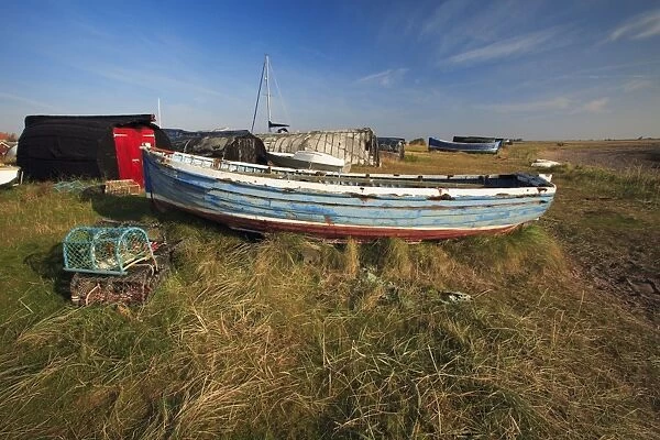 Fishing Boats and Lobster Traps - on Lindisfarne beach, Holy Island, Northumberland, England