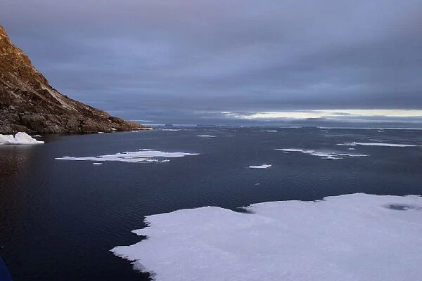 Floating ice in water. North Spitzberg, North Svalbard