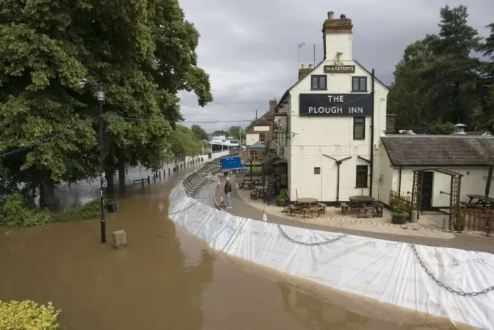 Framed Print : Flood barriers outside Plough Inn fooded alongside River Severn in spate June 27 2007 Upton upon Severn Worcs UK Framed Print : Flood barriers outside Plough Inn fooded alongside River Severn in spate June 27 2007 Upton upon Severn Worcs UK