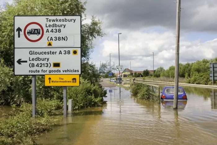 Framed Print : Flooding - cars partly submerged on flooded in Newtown, Tewkesbury Gloucestershire, UK with road sign to Watermeadows following unprecedented flooding of Rivons Avon and Severn above 1947 level Framed Print : Flooding - cars partly submerged on flooded in Newtown, Tewkesbury Gloucestershire, UK with road sign to Watermeadows following unprecedented flooding of Rivons Avon and Severn above 1947 level