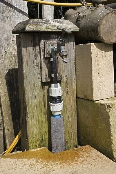 Garden Tap - Water dripping from outside brass tap UK
