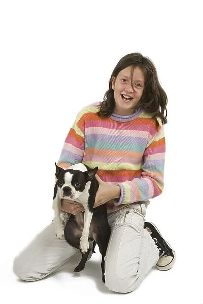 Girl - playing with Boston Terrier