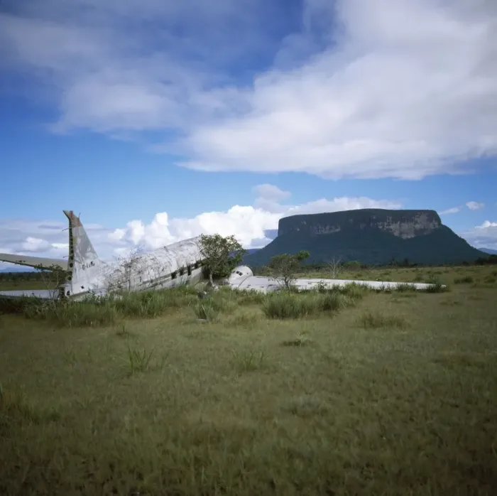 Framed Print : Gran Sabana, Estado Bolivar, Venezuela, South America: crashed DC3 at Alto Carrao with Amauray-tepui in background Framed Print : Gran Sabana, Estado Bolivar, Venezuela, South America: crashed DC3 at Alto Carrao with Amauray-tepui in background