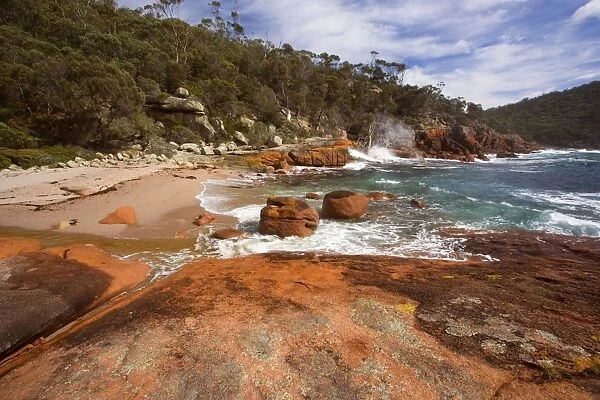 Granite coastline - view along the ragged, rocky coastline in Sleepy Bay - Freycinet National Park, Tasmania, Australia