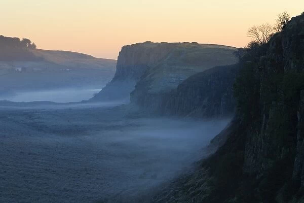 Hadrian's Wall - beside Crag Lough, early morning mist, Northumberland National Park, England