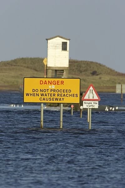 Holy Island causeway - at high tide, showing refuge station, Lindisfarne National Nature Reserve, Northumberland, England