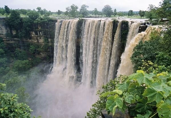 India - monsoon season. Tropical deciduous forest. Dhundwa falls, Panna National Park