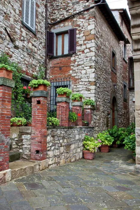 Framed Print : Italy, Radda in Chianti. Entrance to homes along the streets of Radda in Chianti. Date: 26-09-2010 Framed Print : Italy, Radda in Chianti. Entrance to homes along the streets of Radda in Chianti. Date: 26-09-2010