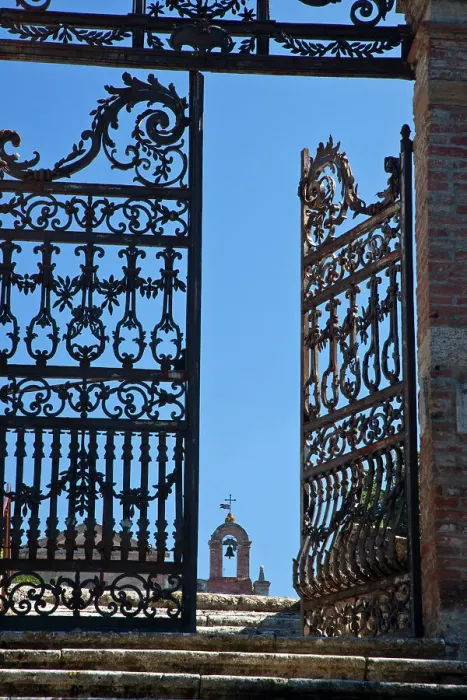 Framed Print : Italy, Tuscany, Montepulciano. The wrought iron gate leading to the cemetery near the Church of San Biaggio. Date: 20-09-2010 Framed Print : Italy, Tuscany, Montepulciano. The wrought iron gate leading to the cemetery near the Church of San Biaggio. Date: 20-09-2010