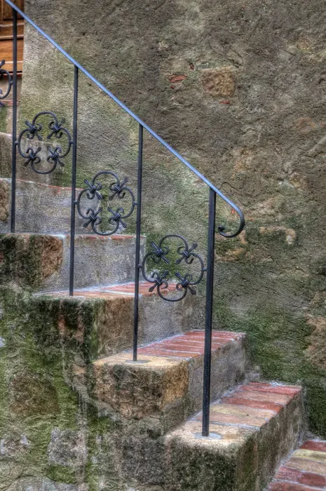 Framed Print : Italy, Tuscany, Pienza. Steps with wrought iron railing leading to the entrance to a home in Pienza. Date: 17-09-2010 Framed Print : Italy, Tuscany, Pienza. Steps with wrought iron railing leading to the entrance to a home in Pienza. Date: 17-09-2010