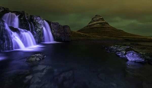 Kirkjufell Mountain and waterfalls at night