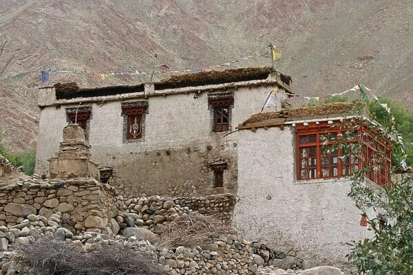 Ladakhi house with fodder on the roof. Ulley. TransHimalaya India
