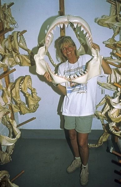 Lady holding Shark Jaws - Being sold as Souvenirs Yemen