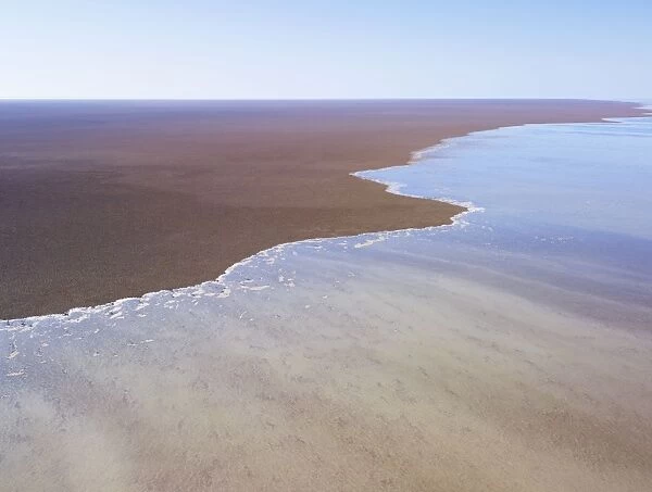 Lake Eyre north South Australia. 2009 flood - Lake Eyre is an extensive salt sink and has only filled to capacity three times in the past 150 years. The massive Lake Eyre system covers an aera of 9690 square kilometre