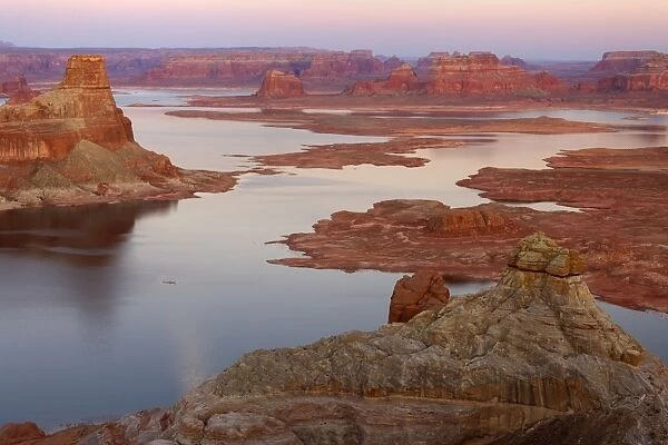 Lake Powell - panoramic view onto Lake Powell and canyons and buttes of red sandstone from Alstrom Point on the northern shore of the lake. The panorama encompasses Padre Bay, with Gunsight Butte in the foreground and Dominguez Butte