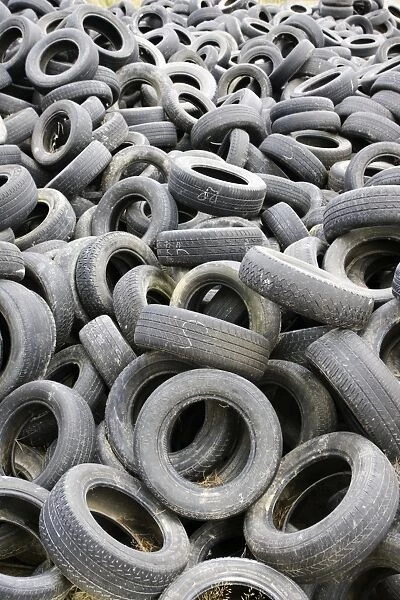 Large pile of old used car tyres, Dunedin, New Zealand
