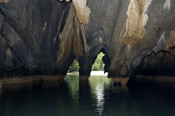 Limestone formations on the exit from the cave - that features a limestone karst mountain landscape with an 8. 2 km. navigable underground river, supposedly the longest navigable underground river in the world
