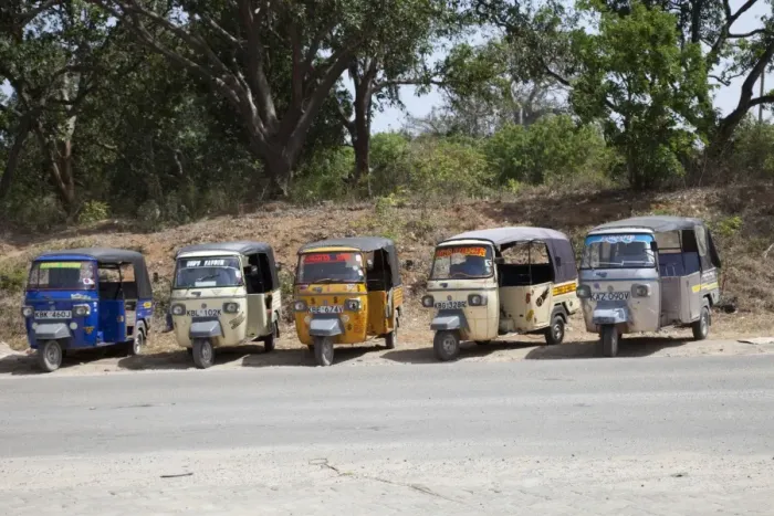 Framed Print : Line of Tuk-Tuk three wheeled motorised rickshaw taxis waiting for passengers Kilifi - Kenya Framed Print : Line of Tuk-Tuk three wheeled motorised rickshaw taxis waiting for passengers Kilifi - Kenya