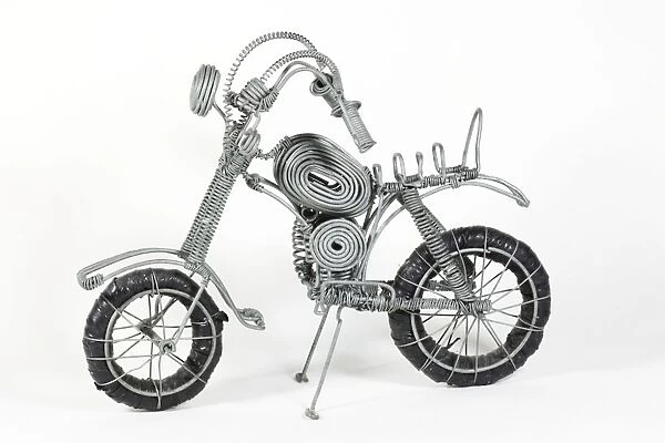 MAB-1265. Model motorcycle made from soft steel wire made and sold by Kenyan street kids