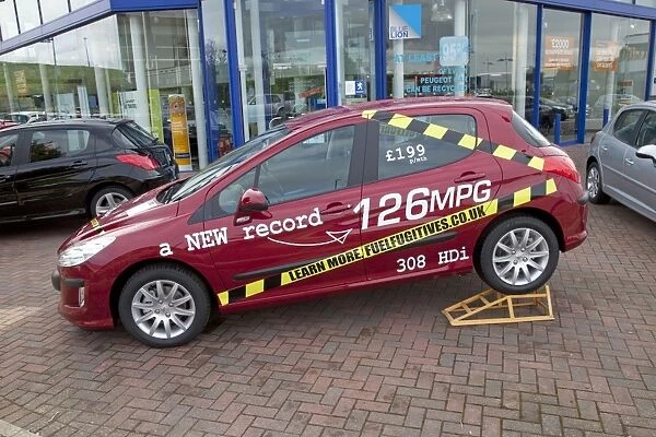 MAB-1284. Peugeot 308 HDI French motor car claiming new record 126 miles per gallon