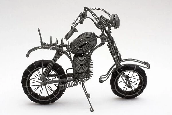 MAB-441. Recycling - Model of Harley-Davidson motorcycle made of scrap wire and inner tube