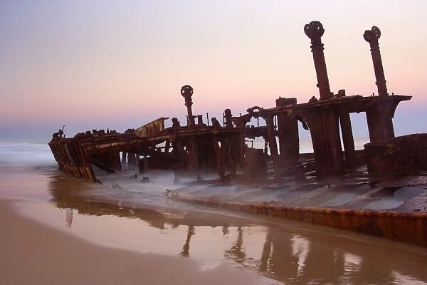 Maheno ship wreck - wreck of the famous Maheno stranded on the eastern beach of Fraser Island, at dusk - 75-Mile Beach, Fraser Island World Heritage Area, Great Sandy National Park, Queensland, Australia