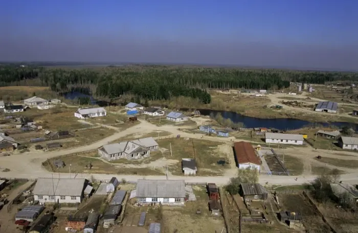 Framed Print : Maloyuganskii village, aerial view over the village and taiga-forest, a fog visible over horizon due to uncontrolled forest fires; a typical siberian village on a small river - a tributary of river Bolshoi Ugan, near Surgut, Siberia Framed Print : Maloyuganskii village, aerial view over the village and taiga-forest, a fog visible over horizon due to uncontrolled forest fires; a typical siberian village on a small river - a tributary of river Bolshoi Ugan, near Surgut, Siberia