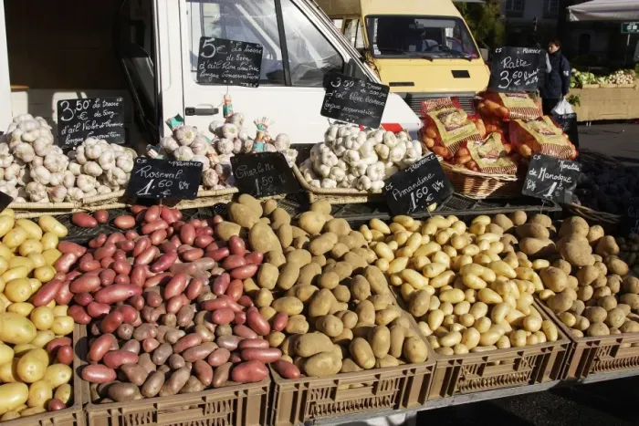 Framed Print : Market - Vegatable stall selling garlic and a variety of potatoes. Nice - France Framed Print : Market - Vegatable stall selling garlic and a variety of potatoes. Nice - France