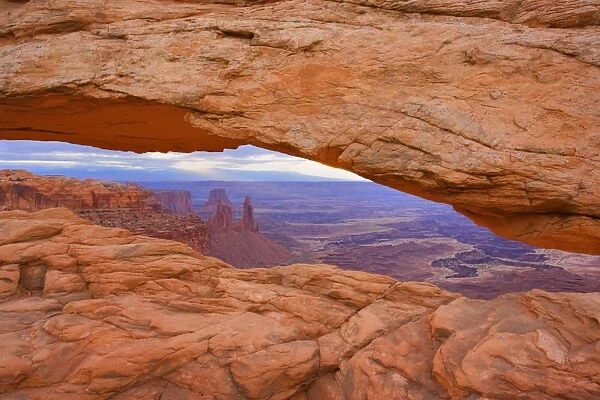 Mesa Arch - View through Mesa Arch into the maze of canyons and rock formations - Islands in the Sky, Canyonlands National Park, Utah, USA