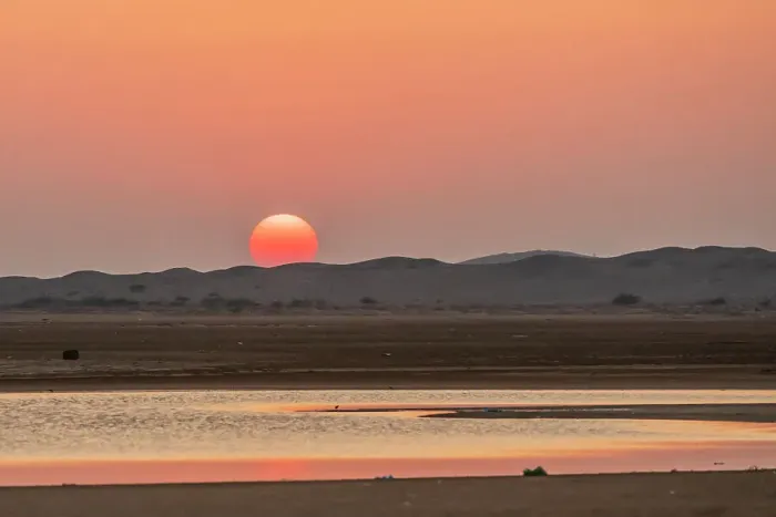Framed Print : Middle East, Arabian Peninsula, Ash Sharqiyah South, Jalan Bani Buali. Sun setting over hills and coastal marsh in Oman. Date: 27-10-2019 Framed Print : Middle East, Arabian Peninsula, Ash Sharqiyah South, Jalan Bani Buali. Sun setting over hills and coastal marsh in Oman. Date: 27-10-2019