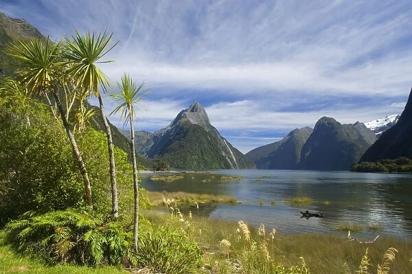 Milford Sound with landmark Mitre Peak and surrounding mountains. Milford Sound is one of the, if not THE, most famous attraction in New Zealand