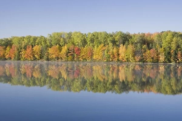 Moccassin Lake with Autumn Colours of Maples Reflected Upper Penninsular Michigan, USA LA004452