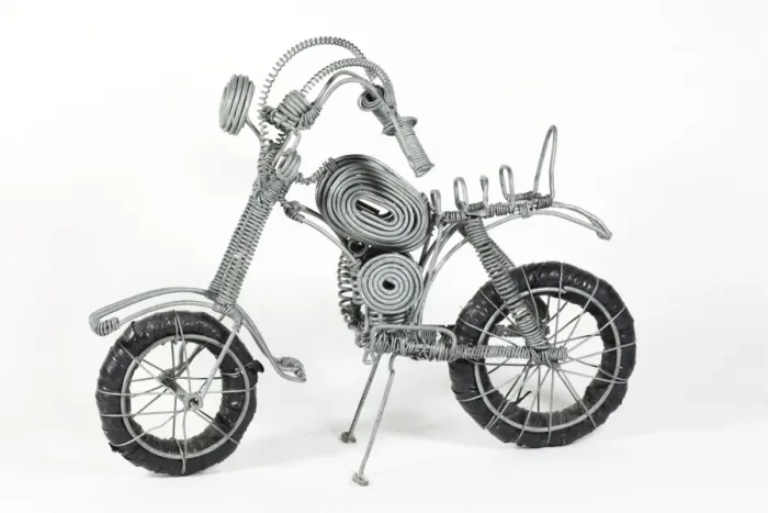 Framed Print : Model motorcycle made from soft steel wire made and sold by Kenyan street kids Africa Framed Print : Model motorcycle made from soft steel wire made and sold by Kenyan street kids Africa