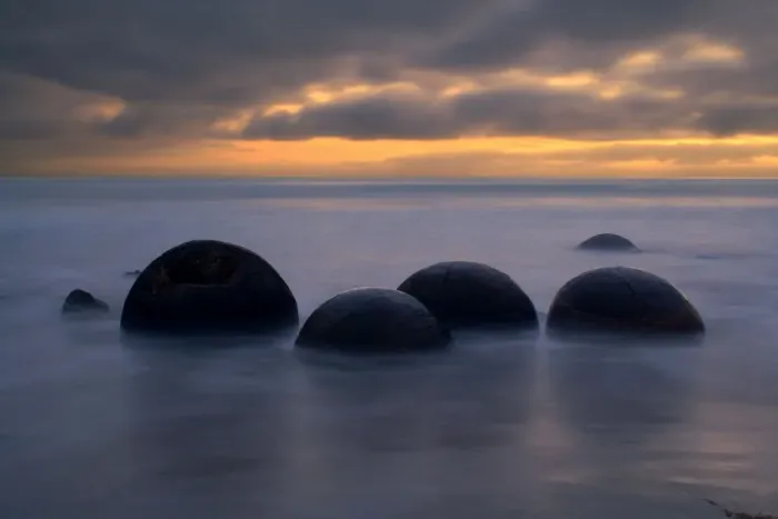 Framed Print : Moeraki Boulders massive spherical rocks at dawn surrounded by water of incoming tide Coastal Otago, South Island, New Zealand Framed Print : Moeraki Boulders massive spherical rocks at dawn surrounded by water of incoming tide Coastal Otago, South Island, New Zealand