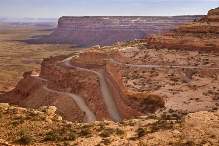 Framed Print : Mokey Dugway - view onto the switchbacks of gravel road UT261, carved into the flanks of the cliff. UT 261 is descending the plateau of Cedar Mesa, view from a place called Mokey Dugway - Cedar Mesa, Utah, USA Framed Print : Mokey Dugway - view onto the switchbacks of gravel road UT261, carved into the flanks of the cliff. UT 261 is descending the plateau of Cedar Mesa, view from a place called Mokey Dugway - Cedar Mesa, Utah, USA