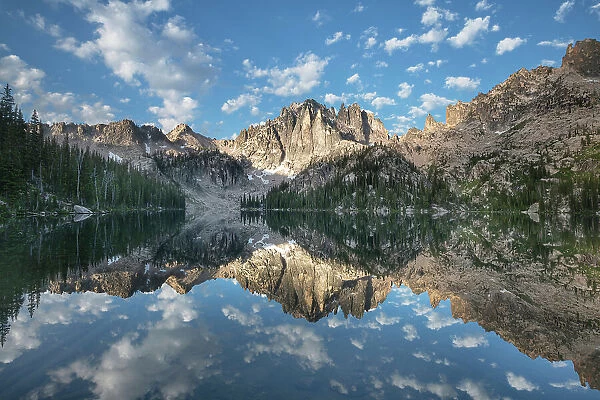 Monte Verita Peak mirrored in still waters of Baron Lake, Sawtooth Mountains Wilderness, Idaho. Date: 04-08-2019