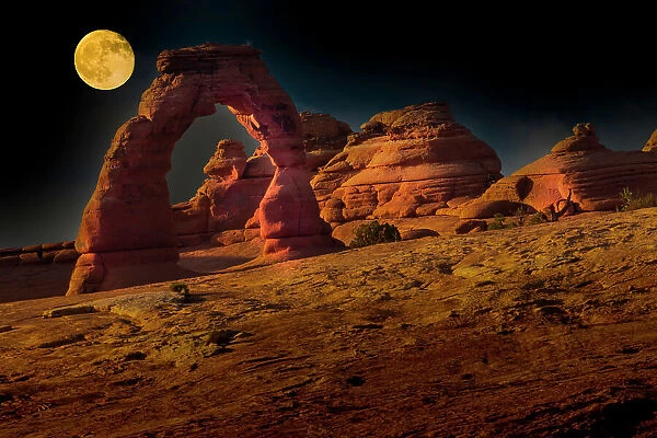 Full moon over Delicate Arch. Arches National Park. Utah, USA. Date: 18-07-2021