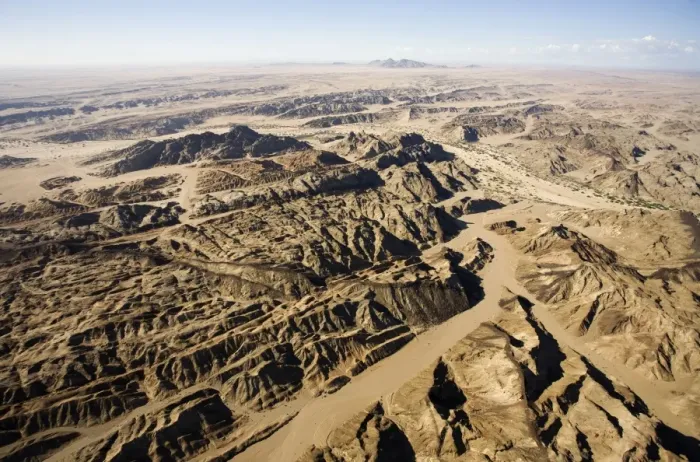 Framed Print : The Moon Valley from the air - landscape showing folded marbles gneisses and doerite dykes - from the 500 million year metamorphism of the Damaran rocks - Damaran orogeny - Namib Desert - Namibia - Africa Framed Print : The Moon Valley from the air - landscape showing folded marbles gneisses and doerite dykes - from the 500 million year metamorphism of the Damaran rocks - Damaran orogeny - Namib Desert - Namibia - Africa