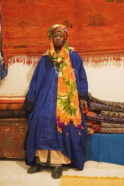 Morocco - Colourful outfit of an employee in a