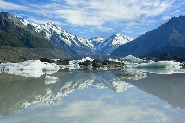 Mount Cook Scenery stunning mountains and Tasman Glacier reflected in Tasman Glacier Lake covered by small icebergs Tasman Valley, Mount Cook National Park, Canterbury, South Island, New Zealand