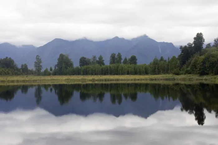 Framed Print : New Zealand - Reflections of southern alps in Lake Matheson - South Westland - South Island Framed Print : New Zealand - Reflections of southern alps in Lake Matheson - South Westland - South Island